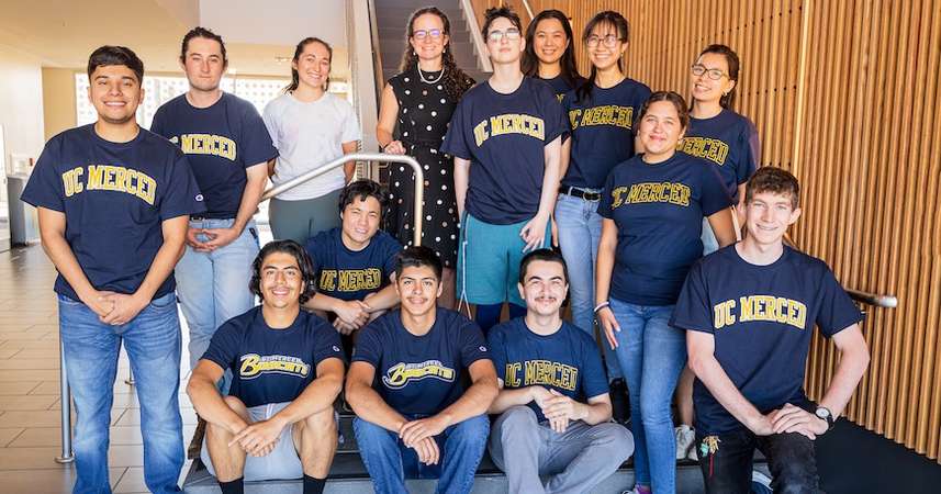 Professor Colleen Naughton is pictured with students in the Summer Bridge program.