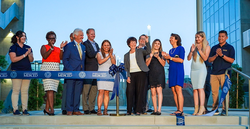 Outgoing Chancellor Dorothy Leland cut the ribbon to signify the opening of the second phase of the Merced 2020 Project.