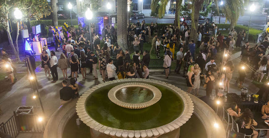 UC Merced graduates celebrate at a party at downtown's Bob Hart Square in May 2022.