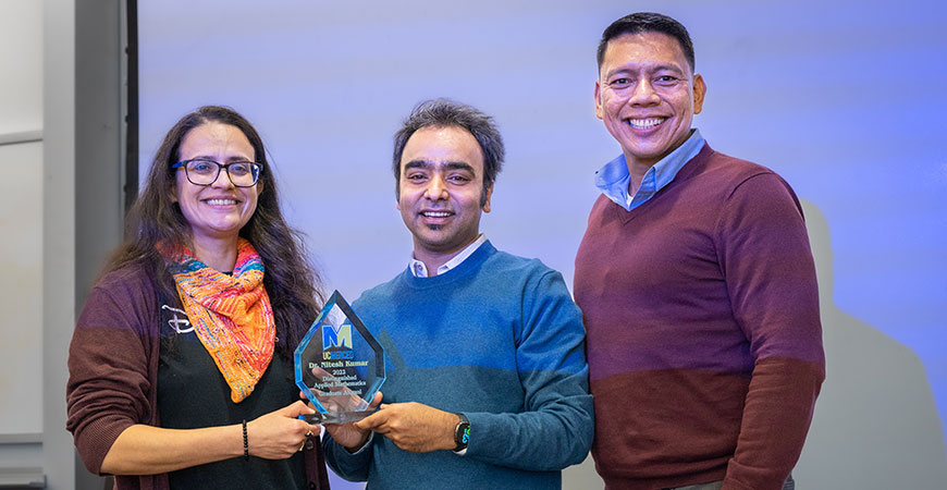 Professor Suzanne Sindi, left, Nitesh Kumar and Professor Roummel Marcia